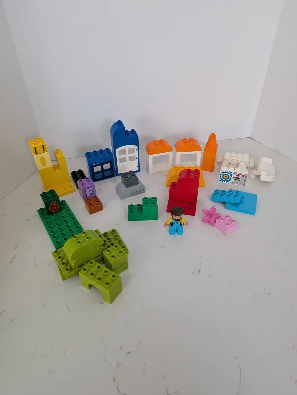 Lego Duplo Blocks In Box~ 54 Miscellaneous Pieces Including Figurine~Building